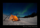 Photographing the northern lights at 2a.m. at -40 is always fun. On this timed exposure, my subject stayed just long enough to create a ghost image by the tent.