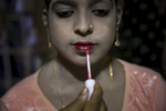  Nur Begum, who doesn't know her age but thinks she is between 14 and 16 years old, has her makeup done on the day of her wedding to Rayeed Alam, 20, in a Bangladesh refugee camp in Cox's Bazar, Bangladesh. Rayeed came to Bangladesh with his family shortly after the August 25th attack. He says the military attacked his village and shot people, burned houses and raped women. It took him 3 days to walk to the Bangladesh border. Rayeed's parents arranged the marriage because all of his sisters are already married and his mother needed someone to cook and look after her and her husband. Nur Begum said that her parents arranged the marriage for her and she had no choice in the matter. 