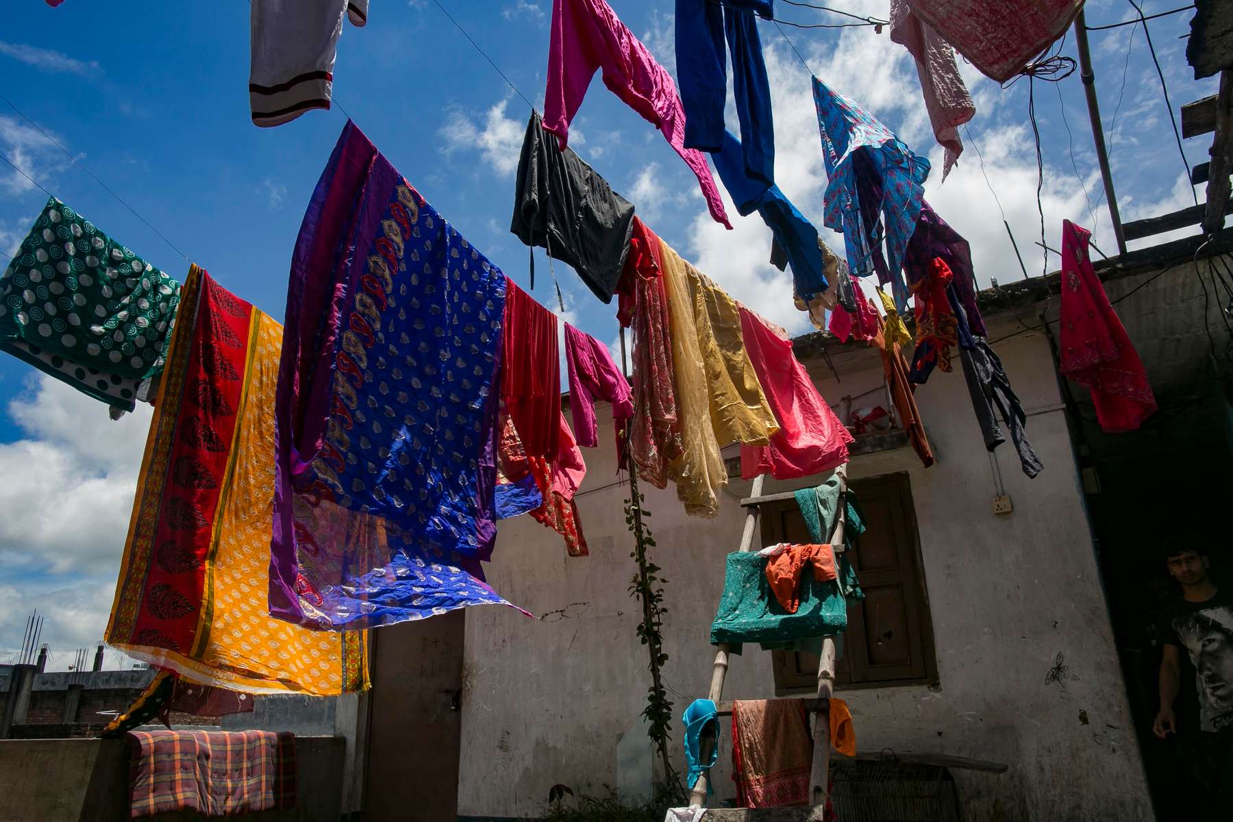 Laundry hangs on the roof of the Mymensingh brothel