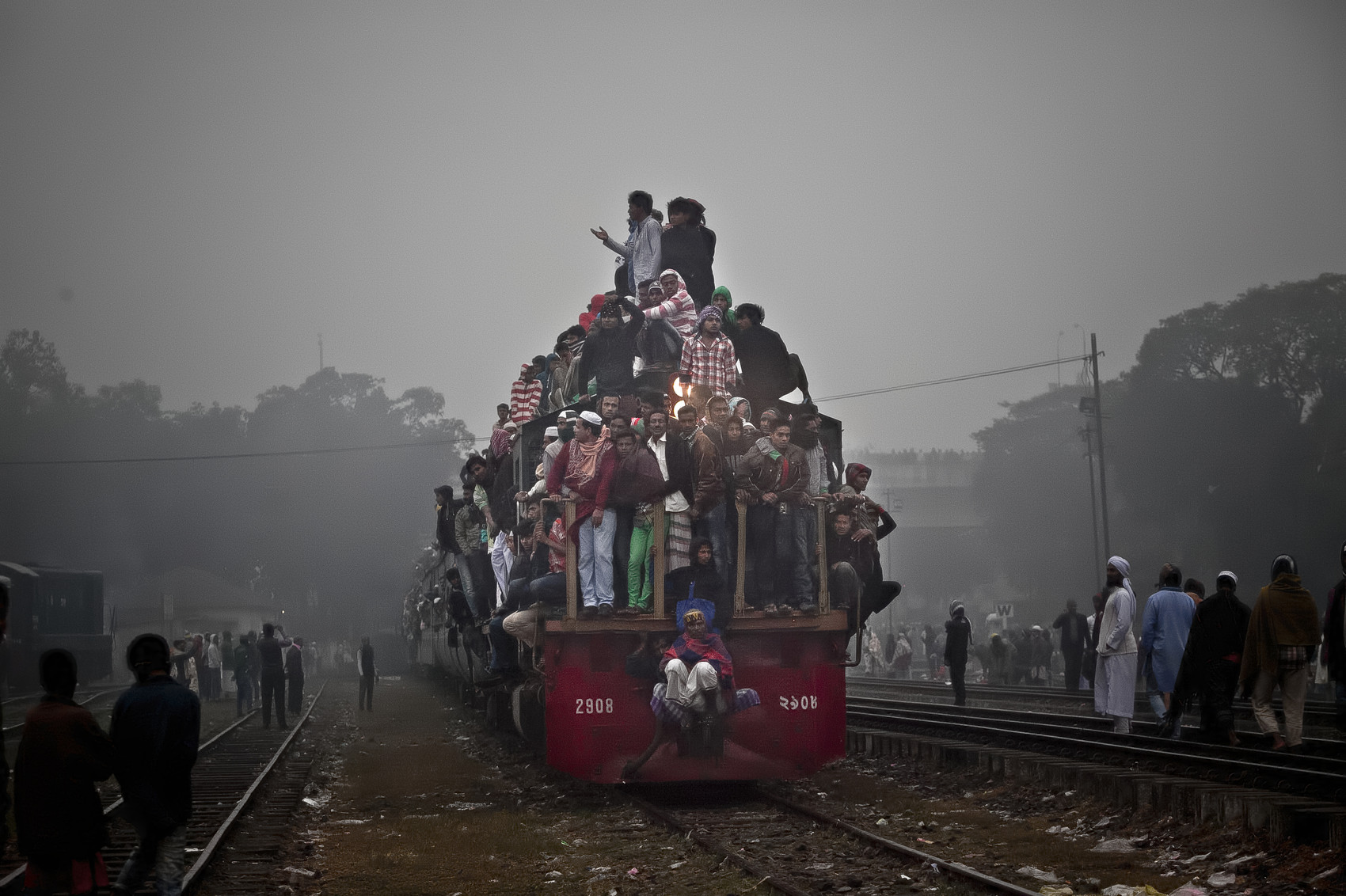 Muslim devotees arrive to Tongi on the last day of the annual Bishwa Ijtema in Tongi, Bangladesh. The Bishwa Ijtema is the second largest gathering of Muslims in the world, after the Hajj, and is organized by World Tablig Council, which preaches teachings of Islam and prophet Mohammad. (Photo by Allison Joyce/Getty Images)