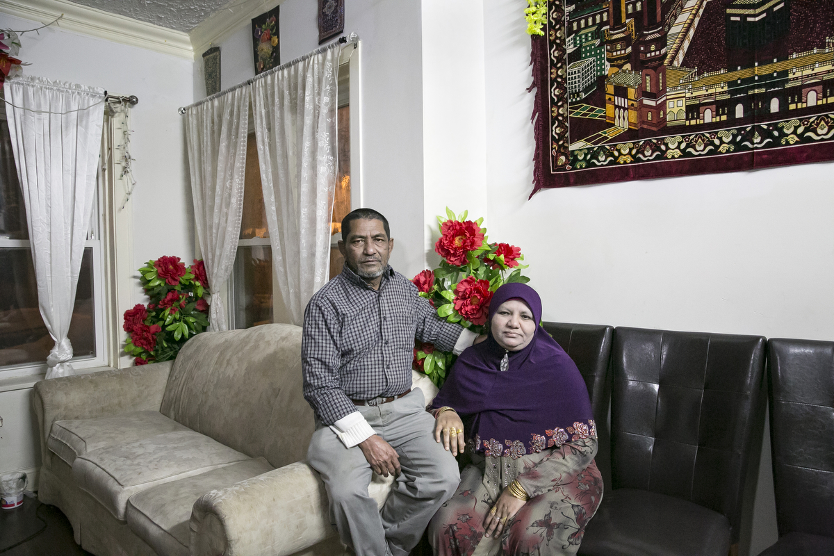 Mohammad Shukor and his wife Noor Jahan pose for a photo in their home on January 12, 2019 in Chicago, Illinois. The Shukor family arrived in Chicago in 2014 from Malaysia. Mohammad Shukor fled Myanmar in 1978 after the military shot him and arrested his father, who died in jail. He fled to Thailand by boat and spent 5 years there before making his way to Malaysia with his family. In Malaysia he and his family were denied an education, had to work illegally, and were frequently arrested and harassed by authorities. When he and his family were resettled in the US he says he {quote}felt so happy to finally have a country, to finally have a place to call home{quote}. 