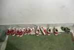 Girls shoes are lined up before school at the Veerni Institute  
