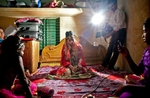 15 year old Nasoin Akhter poses for a video on the day of her wedding to a 32 year old man in Manikganj, Bangladesh.  