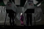 3-year-old Fiana waits for her parents to vote in the presidential elections in a tent in Midland Beach in the Staten Island borough of New York City. As Staten Island continues to recover from Superstorm Sandy, a few polling stations have been relocated due to power outages or ongoing use as an evacuation center. 