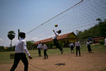 Kids play a volleyball game at Kamrieng school March 30, 2019 in Kamrieng , Cambodia.