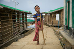 Aziz * is seen outside his shelter. Aziz* is a Rohingya refugee boy who lives with his family in the Rohingya refugee camps in Cox’s Bazar, Bangladesh. Aziz* and his family arrived in Cox’s Bazar nine months ago, after fleeing violence in Myanmar. 