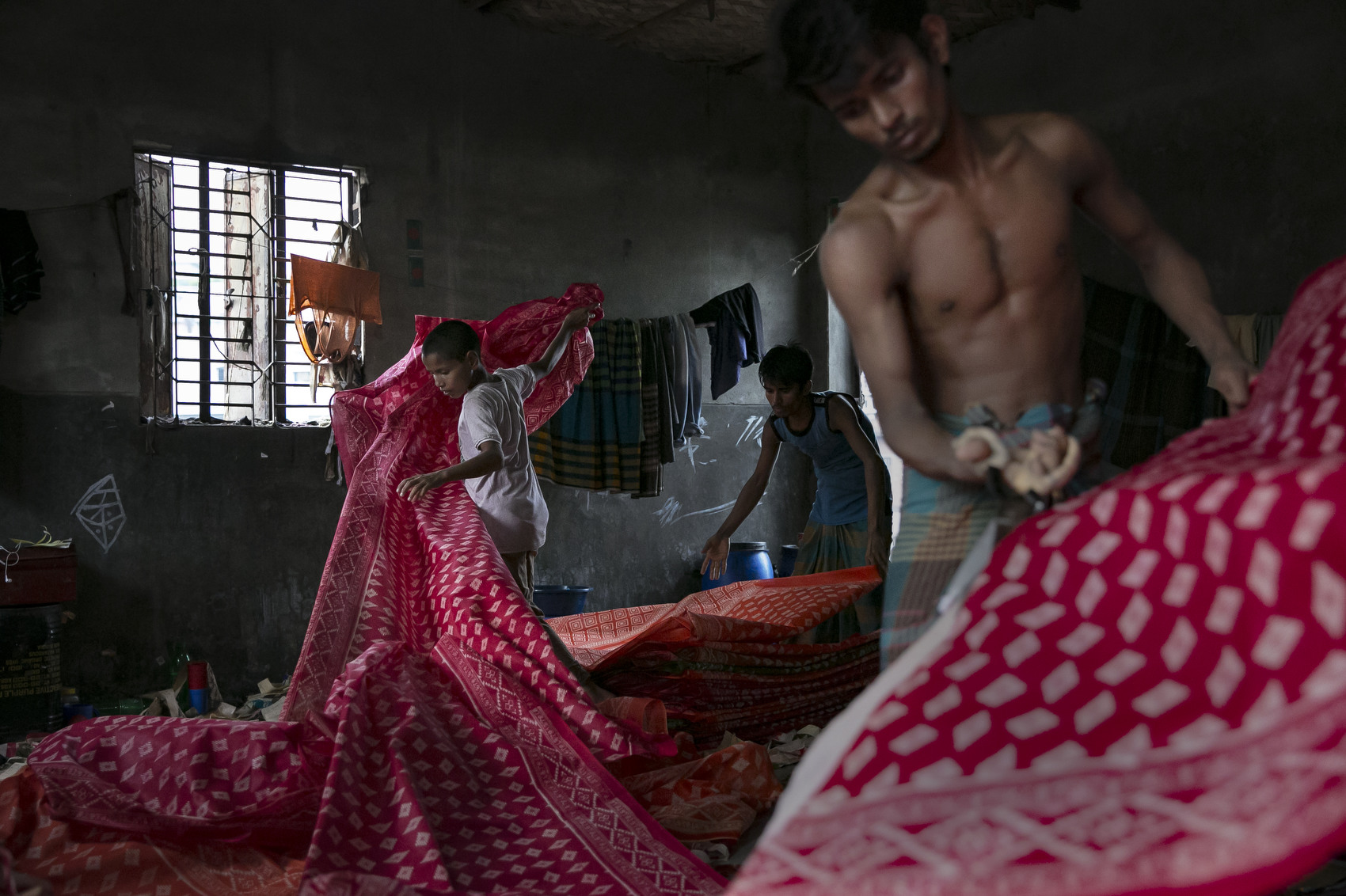 People work in a dying factory in Shyampur, whose waste is dumped into the Buriganga river in Dhaka, Bangladesh. Bangladesh has been reportedly ranked 10th out of the top 20 plastic polluter in the world with the Buriganga river known as one of the most polluted rivers in the country due to rampant dumping of industrial and human waste. Like many developing countries, Bangladesh lacks the infrastructure to effectively manage their waste which causes problems in keeping the waters safe for human and aquatic lives while dozens of tanneries on the banks of the river contribute industrial waste into the ground water. As June 5 was marked by the United Nations as World Environment Day, Buriganga symbolizes the general state of many rivers in Bangladesh, with the growing levels of pollutants and plastic waste consuming up all oxygen in the river and affecting our seafood while fishes consume bits of plastic which mimics their natural food sources and eventually lands on our dinner table. (Photo by Allison Joyce/Getty Images)