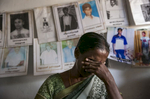 Thagbsiwaran Sivaganawathy cries while discussing the disappearance of her daughter, Thageswaran Susanya, at a protest site for loved ones of the disappeared in Mullaitivu, Sri Lanka. Thagbsiwaran Sivaganawathys daughter, Thageswaran Susanya, has been missing since March 14 2009. They were at their home when military surrounded the village and bombs were dropped from airplanes. They all fled and in the chaos got separated, and Sivaganawathy hasnt seen her daughter since. Sivaganawathys husband is so depressed he cant work or leave the house sometimes. She has searched all over and filed complaints with the ICRC and police, but hasn't found any news. She comes to this protest site 3 times a week demanding for the release of her daughter. 