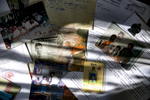 Photos and documents related to the disappearance of Sujeekaran are seen in Mullaitivu, Sri Lanka. Ranchana Pirapakarado has been missing her son, Sujeekaran, since May 23, 2009 when they got separated at a government checkpoint while being transferred from a refugee camp. Afterwards, she searched all the 23 refugee camps across the country and military bases and couldn't find him. In 2014 she got a call from the Terrorist Information Camp who said her son was in Colombo. She answered his questions on the promise that her son would be freed but he never was. 