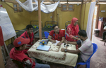 Staff works at the PHCC October 1, 2018 in the Rohingya refugee camp in Cox's Bazar, Bangladesh. The 20 bed Primary Health Care Centre has a structure that includes a maternity unity, a pharmacy, separate buildings for triage, inpatients and outpatients, and its own water tower and generator. The centre is the only one in the area to provide 24/7 in-patient care and will serve a population of 20,000 people, both Rohingya refugees and host community. The centre runs 24 hours 7 days a week, and is also accessible for ambulances, which bring patients referred from facilities without capacity to keep patients overnight.