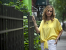 Country music singer Chely Wright poses for a portrait along the sidewalk in the Hells Kitchen neighborhood in New York 