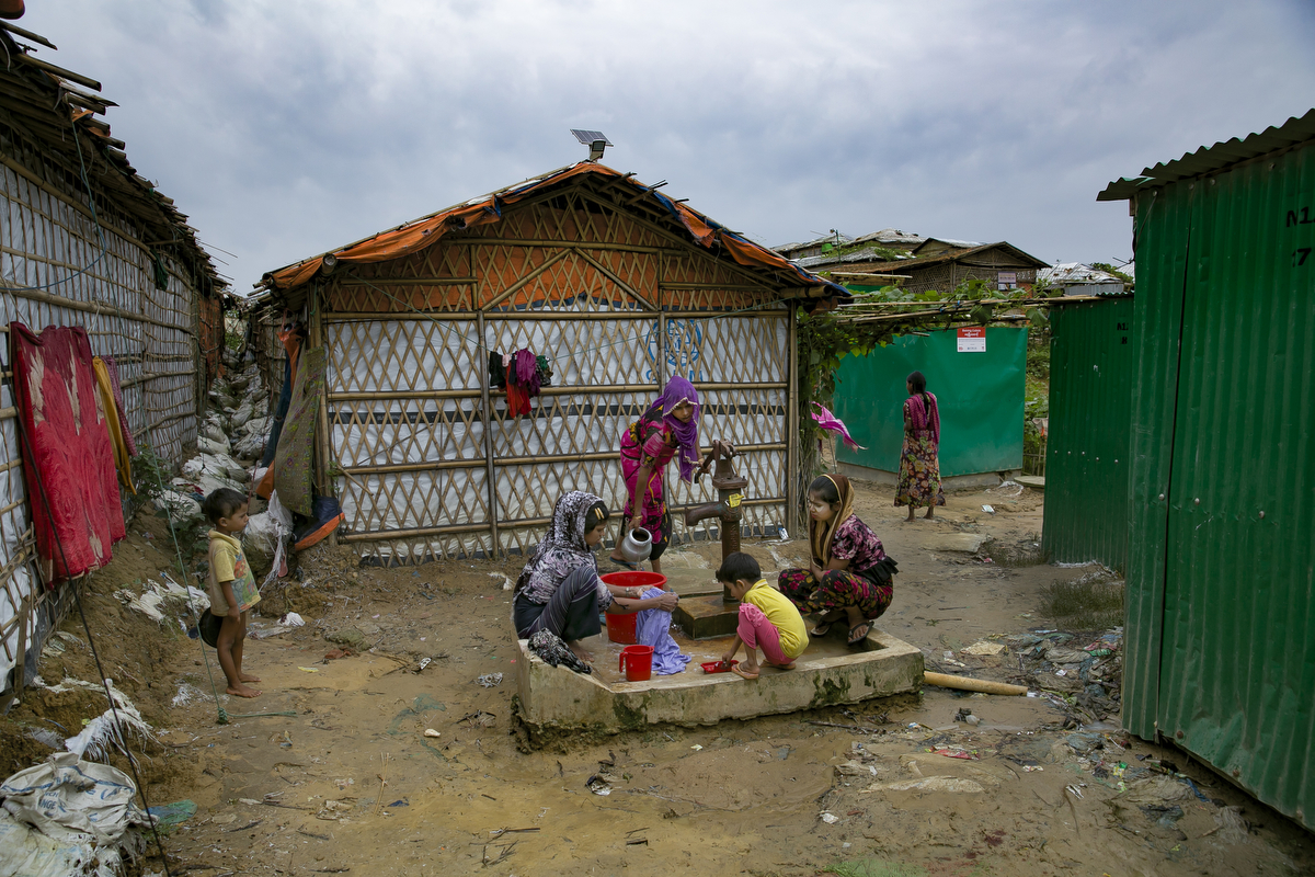 Women and children are seen in the widows camp. In the refugee settlement of Balukhali, over 116 widows, orphans, and women who have been separated from their husbands have found shelter within a dense settlement of 50 red tents where no men or boys over the age of 10 years old are allowed.