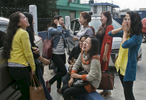 Girls hang out between classes at a university in Shillong