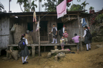 Girls come home from school in Dowki village