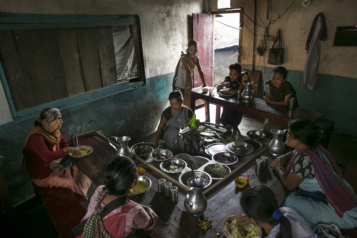 Women eat at a restaurant during their lunch break in Dowki