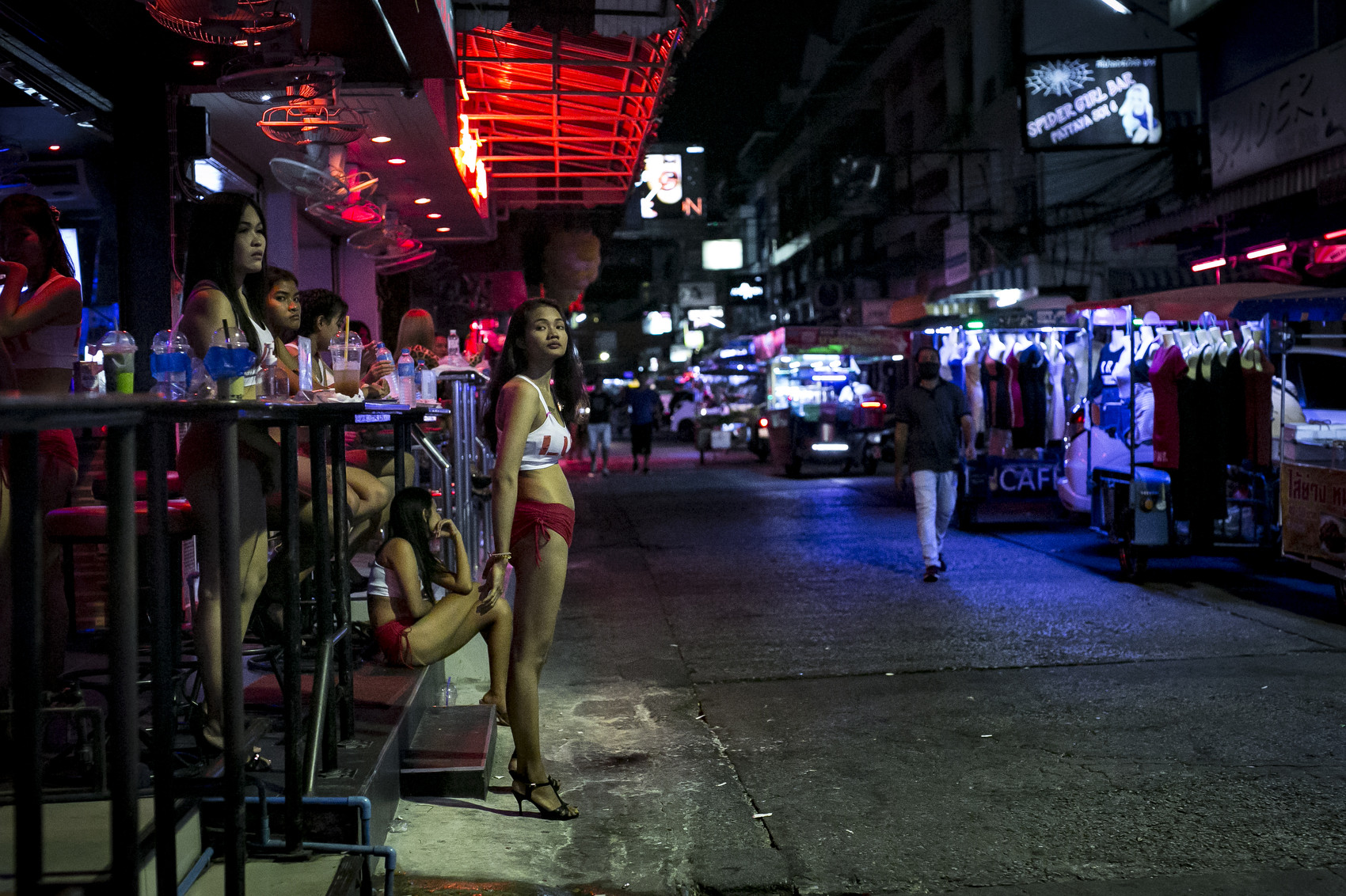 A girl waits for a customer in a red light district in Pattaya , ThailandWith entry into Thailand still restricted, and relatively few tourists able to enter, a good living has turned into a bad one for the country's sex workers.