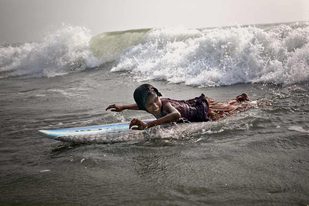 Johanara tries to catch a wave