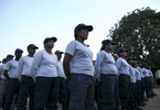  Female de-miners attend roll call before going to clear mines in Muhamalai, one of the biggest minefields in the world