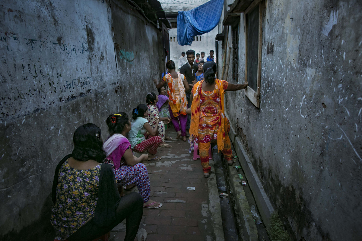 Women waits for customers at the Jessore brothel in Bangladesh