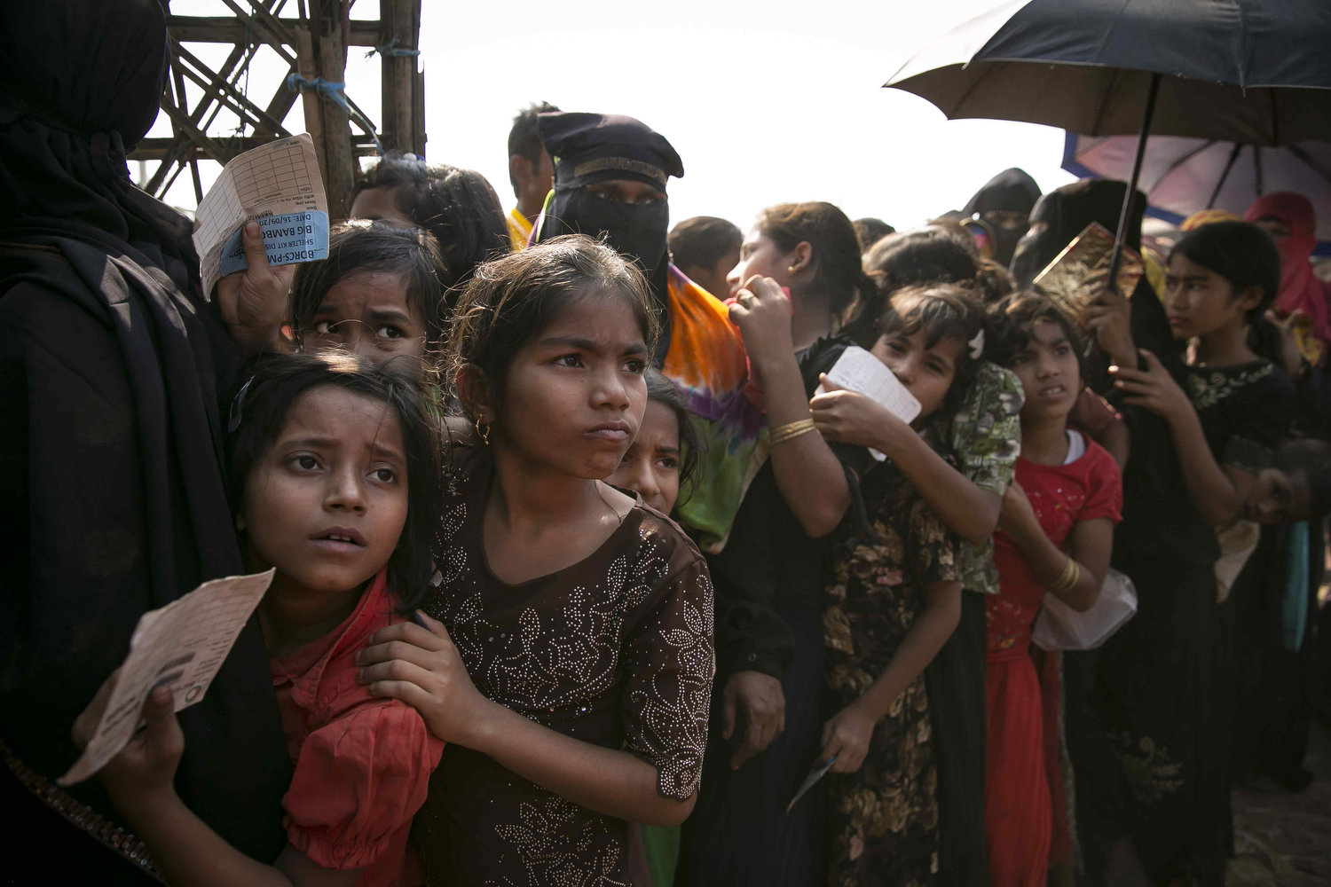 Rohingya refugees queue for a blanket distribution in a refugee camp in Cox's Bazar, Bangladesh. The UN's International Court of Justice in The Hague began on Tuesday hearing a case filed by The Gambia against Myanmar over the Rohingya genocide case. 