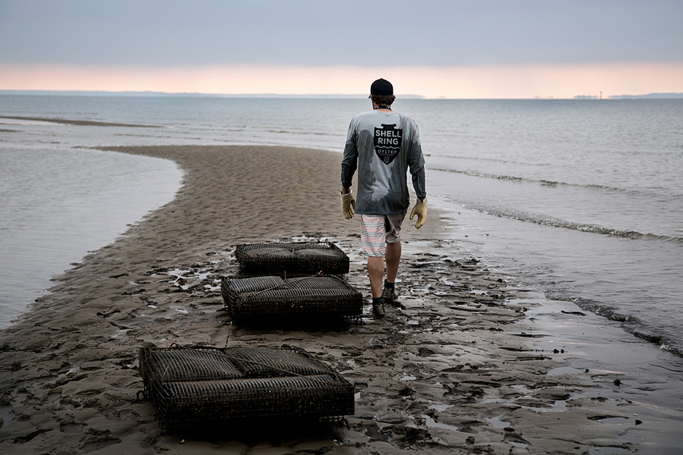 Editorial photography on location advertising oyster farmers.