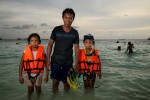 A family on holiday from Koh Muk, Thailand. Pattaya Beach - Koh Lipe, Thailand