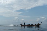 An Urak Lawoi' man uses his boat to shuttle visitors to and from the archipelagos many dive sites, beaches and resort destinations.