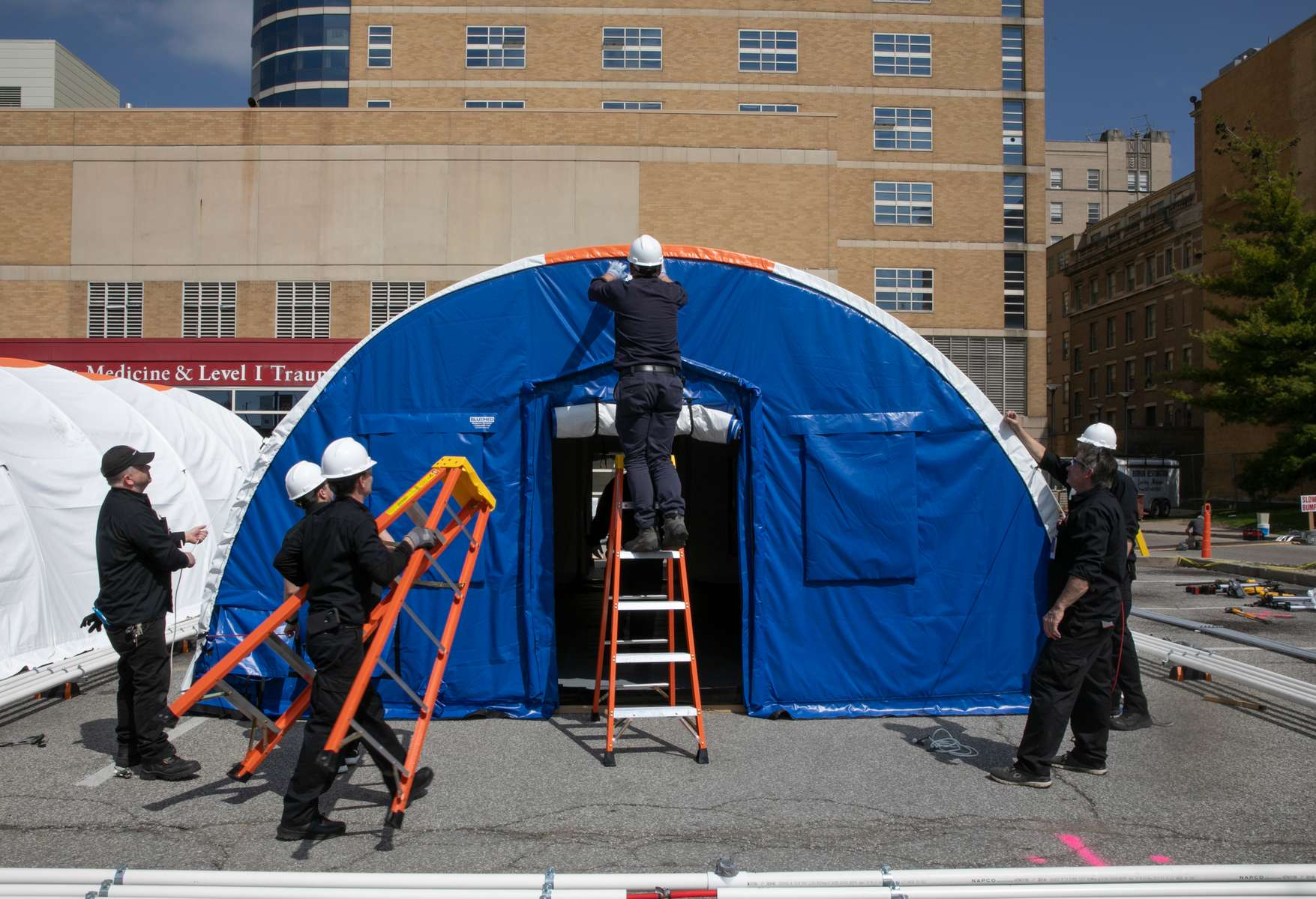 April 06, 2020. COVID Coverage. Medical tents are erected outside IU Health Methodist Hospital Emergency Department Monday April 6, 2020. The tents are equipped with negative airflow, water, power, and can hold 10 patients each. 