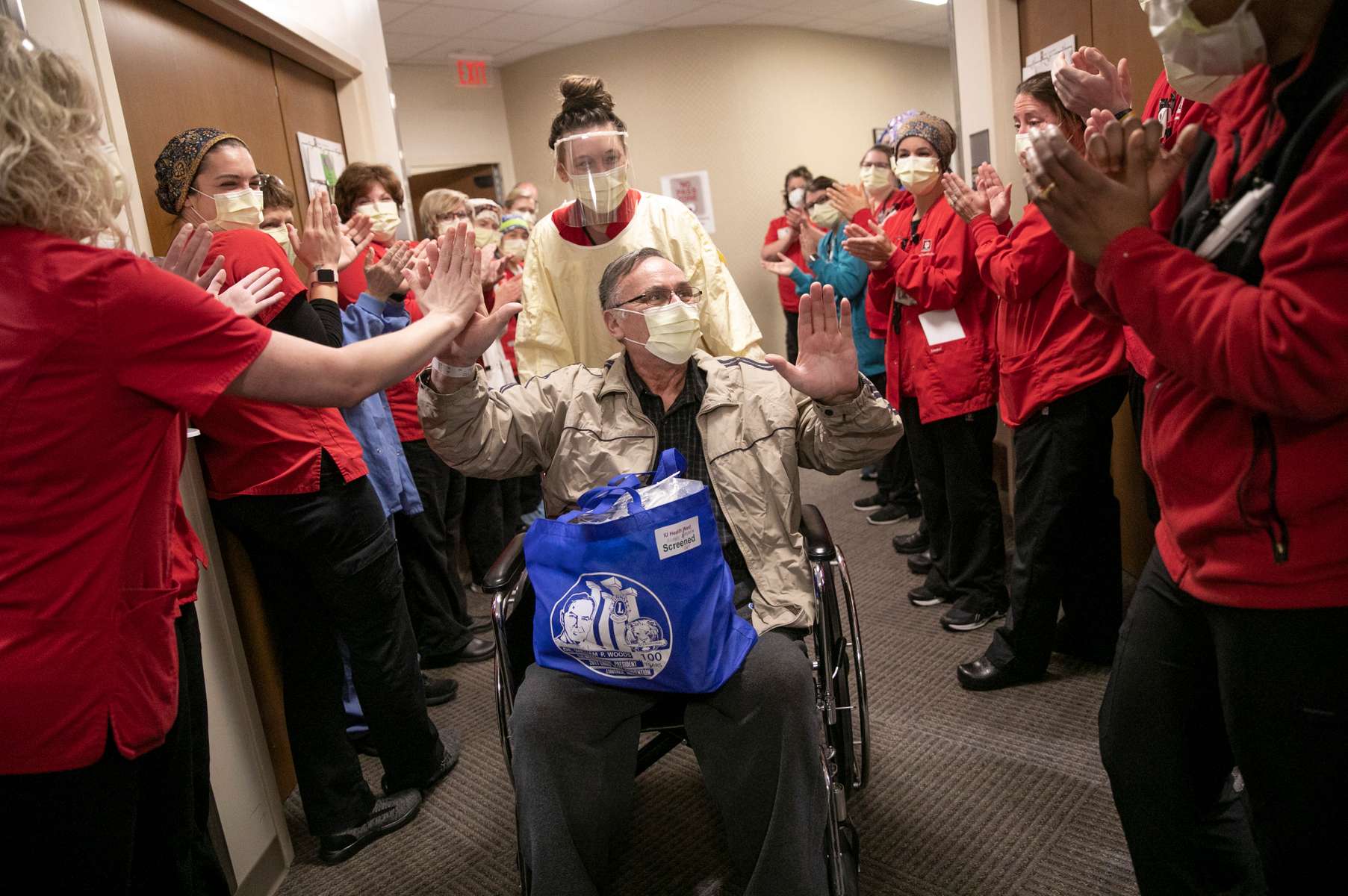 April 15, 2020. COVID Coverage. Patient Nicholas Xinopoulos gets a warm send off after being discharged from IU Health West Hospital Wednesday April 15, 2020. . At one point, much of his family, including his wife, son, and daughter were all in the hospital, most of them on ventilators. Nicholas was the last of his family to be discharged. 