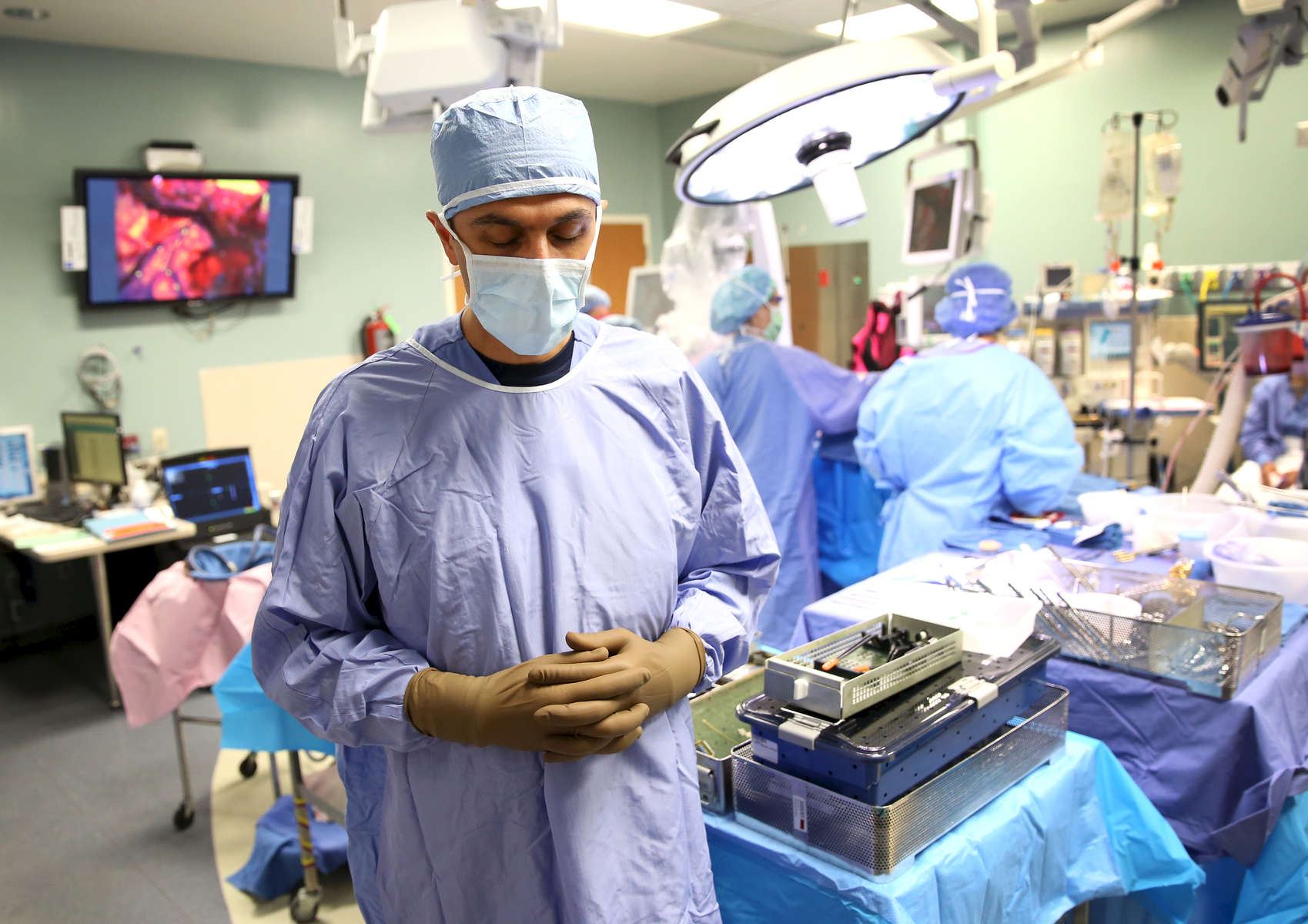 IU Health Neurosurgeon Dr. Aaron Cohen-Gadol takes a moment to himself before operating on a brain tumor at IU Health Methodist Hospital. 