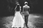 A blurry image of a recently married bride and groom.