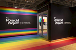 The Polaroid Project: At the Intersection of Art and Technology was an exhibition in two adjacent gallery spaces that explored various dimensions of the relationship between the art and technology of Polaroids, with over 200 photographs and 100 objects. To unite the two galleries, and the art and the technology, the iconic Polaroid spectrum rainbow logo was translated into a continuous spine through the centerline of the exhibition, tying together the 2 gallery spaces, display cases, immersive seating, and a connecting wall. The display cases featured artifacts including prototypes, components, and cameras tracing the Polaroid company’s many technological innovations over time. Photographs were displayed on “baffle” walls inspired by the interior of a 20x24 large format instant camera, which was also prominently displayed in the exhibition.Visit the VR tour here. 