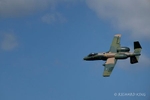 Colour aviation photograph of an A-10 Thunderbolt II Warthog heading right to left