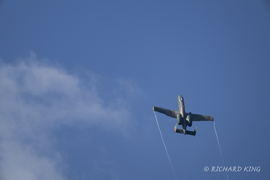 Colour aviation photograph of an A-10 Thunderbolt II Warthog heading right to left