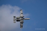 Colour aviation photograph of an A-10 Thunderbolt II Warthog heading left to right
