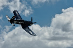 F-4U Corsair in flight showing the characteristic inverted {quote}gull wing{quote} wing design