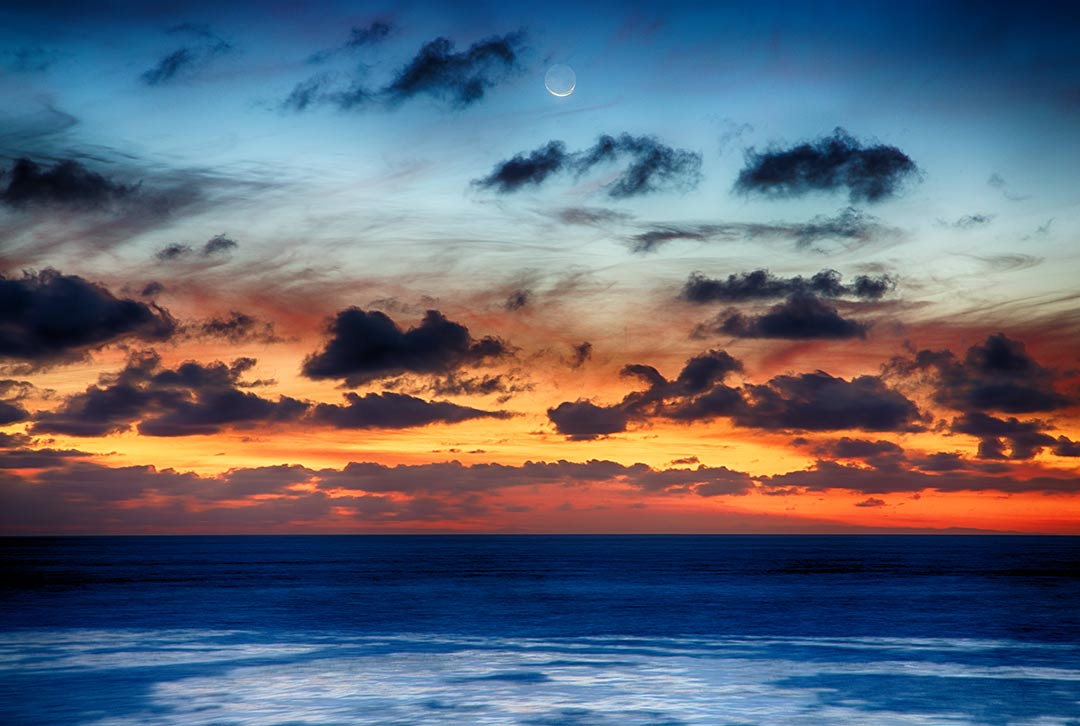 On the first day of the Chinese New Year, {quote}Year of the Horse{quote} I witnessed the sunset and moonrise at the same time. Beacon's Beach, Encinitas, California