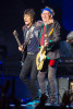 Ronnie Wood, left, and Keith Richards of the Rolling Stones perform at the Wells Fargo Center in Philadelphia.