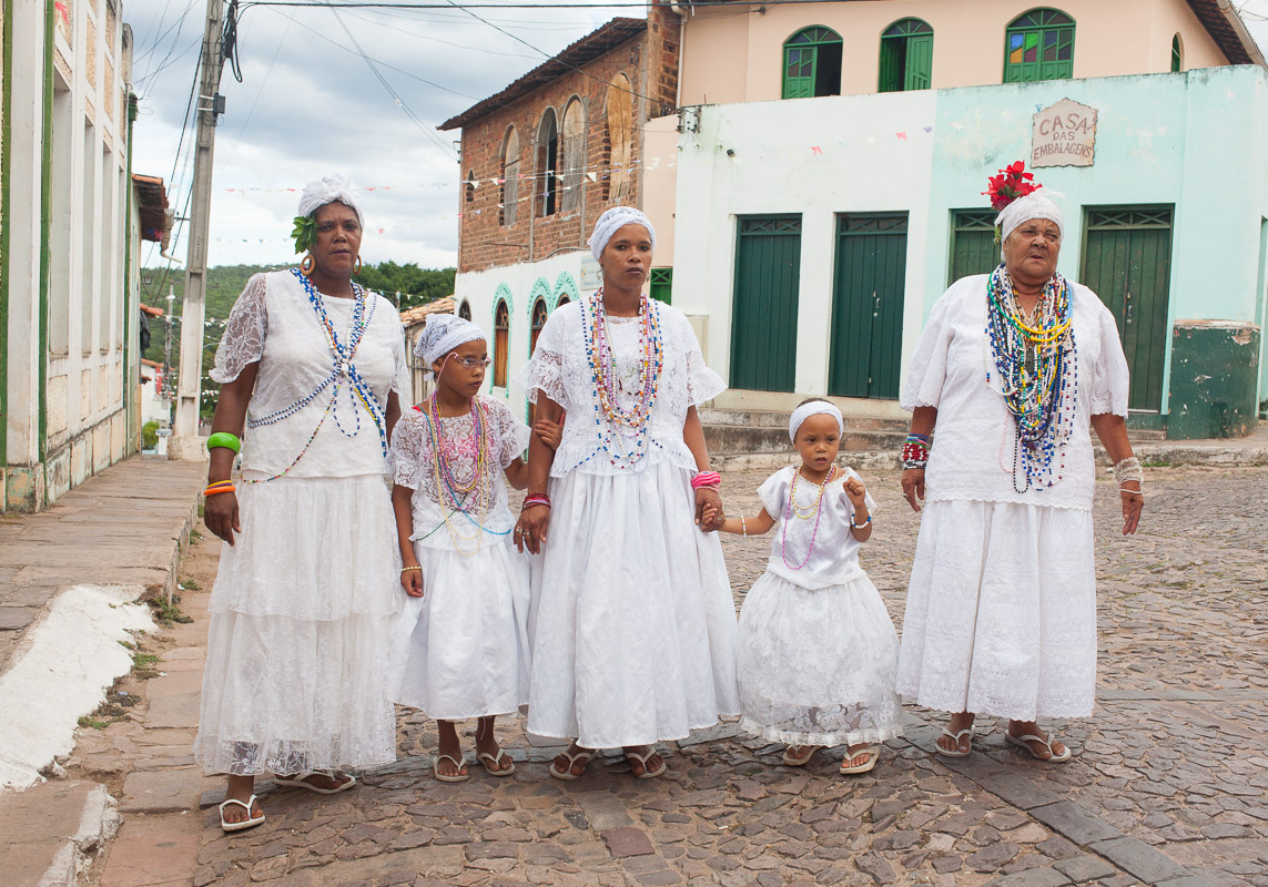 Afro-Brazilian women participate in a religious festival for the patron saint of Lençois, Bahia.