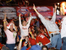 Phillies fans celebrate their team's victory moments after the final out of the 2008 World Series at Chickie's and Pete's bar and restaurant several blocks from the stadium in South Philadelphia Wednesday, Oct. 29, 2008.
