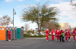 Santas line up for the restroom before the Santa Claus 5K in Las Vegas, NV.
