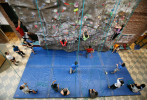 Wharton students participate in a rock-climbing workshop at the Potruck Center at the University of Pa. 