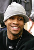 Allen Iverson of the Philadelphia 76ers jokes with the press following a team practice in Philadelphia. 
