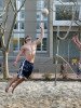 A student plays volleyball on the campus of the University of Pa.