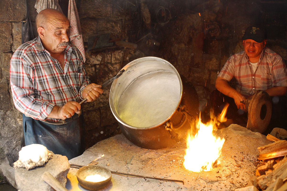 Workers make a metal pot in Sanliurfa, Turkey.