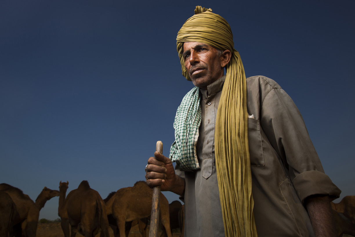 A camel trader poses for a photo in Pushkar. 