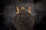 A miner prepares to carry a load of coal to the surface in the Jaintia Hills.