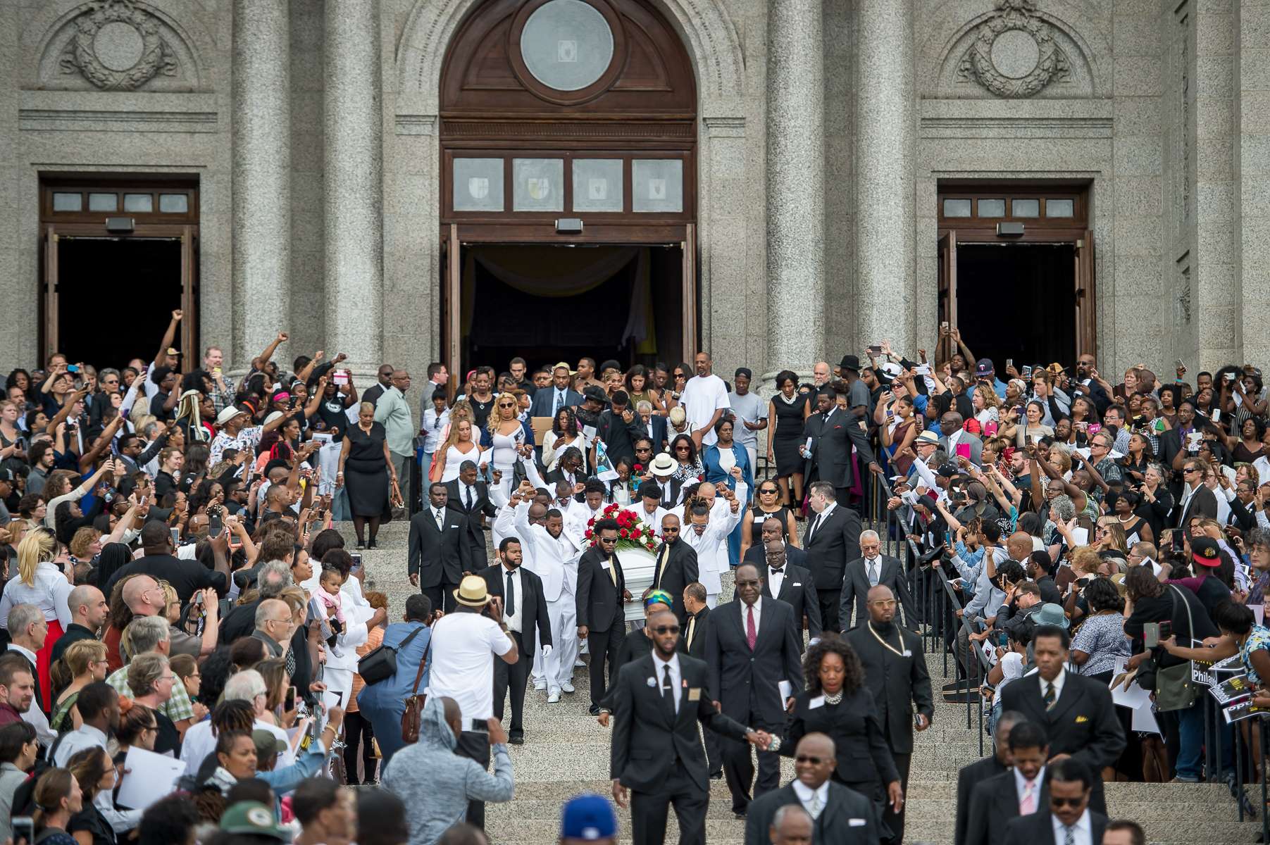 A crowd gathered outside the St. Paul Cathedral as pallbearers dressed in white brought Philando Castile’s casket down the Cathedral steps on July 14, 2016 in St. Paul, MN.