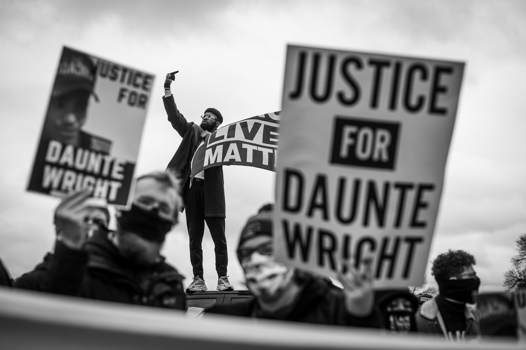 Protesters gathered outside the Brooklyn Center police station on April  12, 2021 to demand justice for the police killing of Daunte Wright on April 11, 2021 in Brooklyn Center, MN.