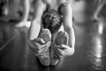 Olive Murdoch Meyer, a student at St. Paul Ballet, stretches during class on April 29, 2014 in St. Paul, MN.